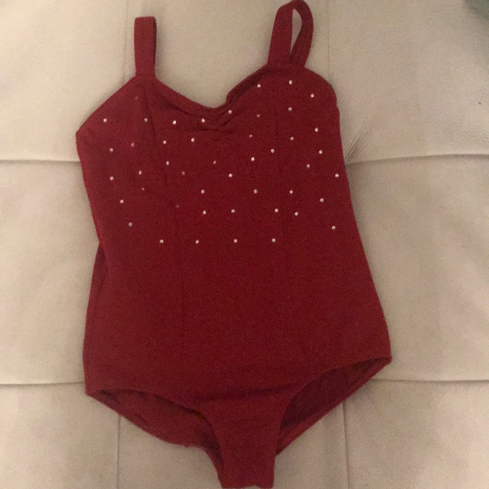 Red bedazzled leotard.